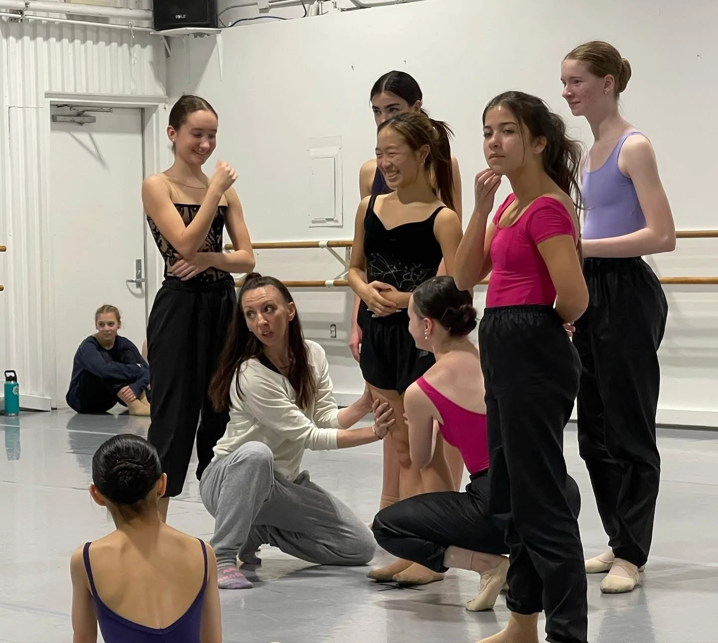 Maeghan McHale speaking with dancers during rehearsal