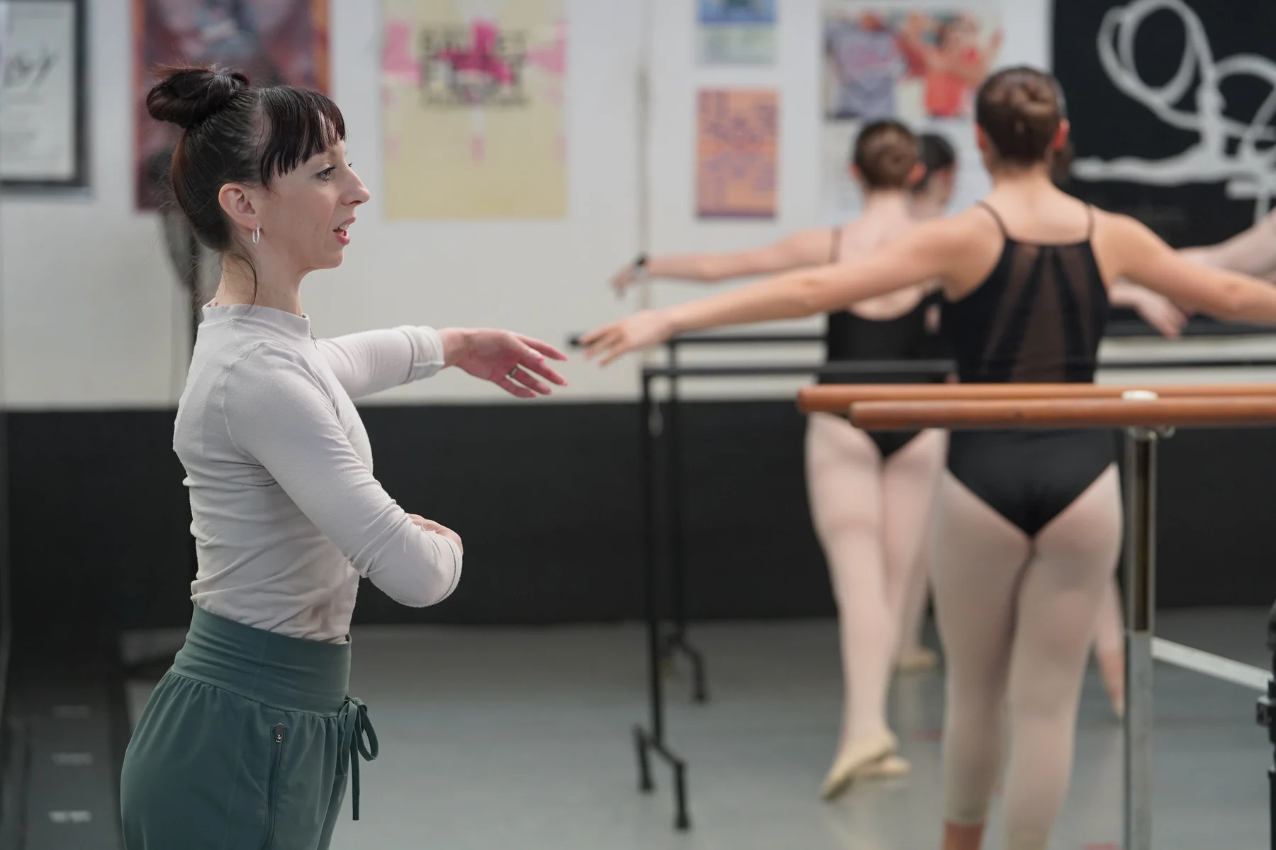 Maeghan McHale coaching dancers in a studio
